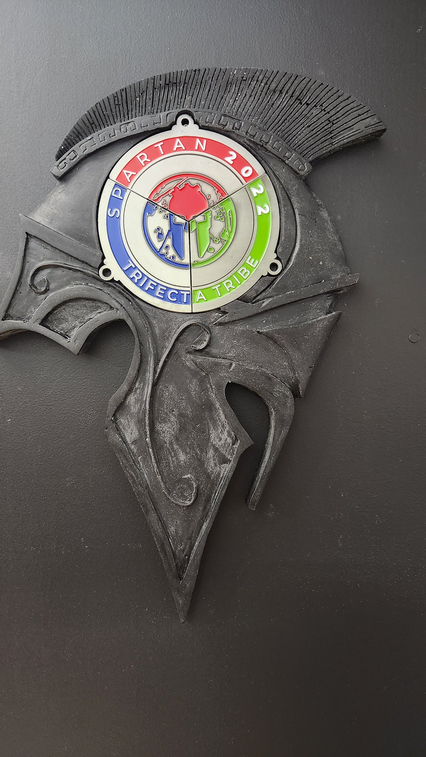 Spartan Race Trifecta holder side profile with trifecta wedge recess
