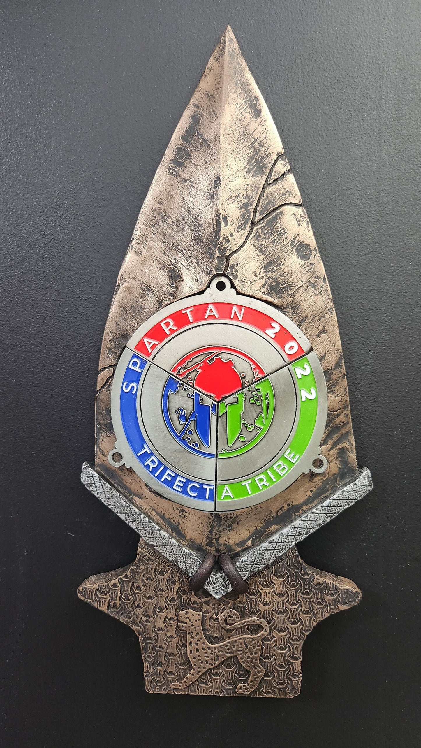 Spartan Race 2023 Leopard design Spear Trifecta Medal display